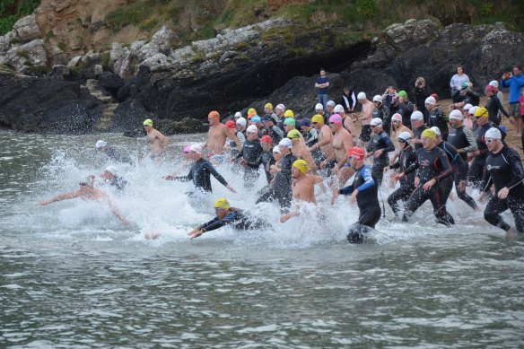 Swimmers take to the water at the start of the annual RNLI Myrtleville to Church Bay Swim recently. Picture: Howard Crowdy