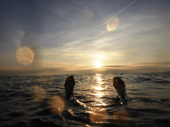 Feet point the way for the sun.