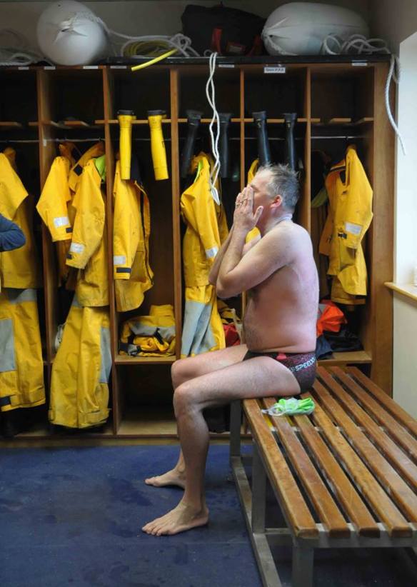 Caught on camera as the enormity of the con he pulled off weighed down even his giant shoulders.