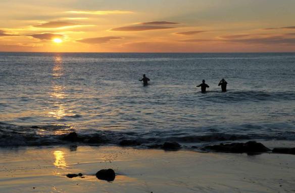That guy on the left looks like a great swimmer. You can just tell by the stand of him.